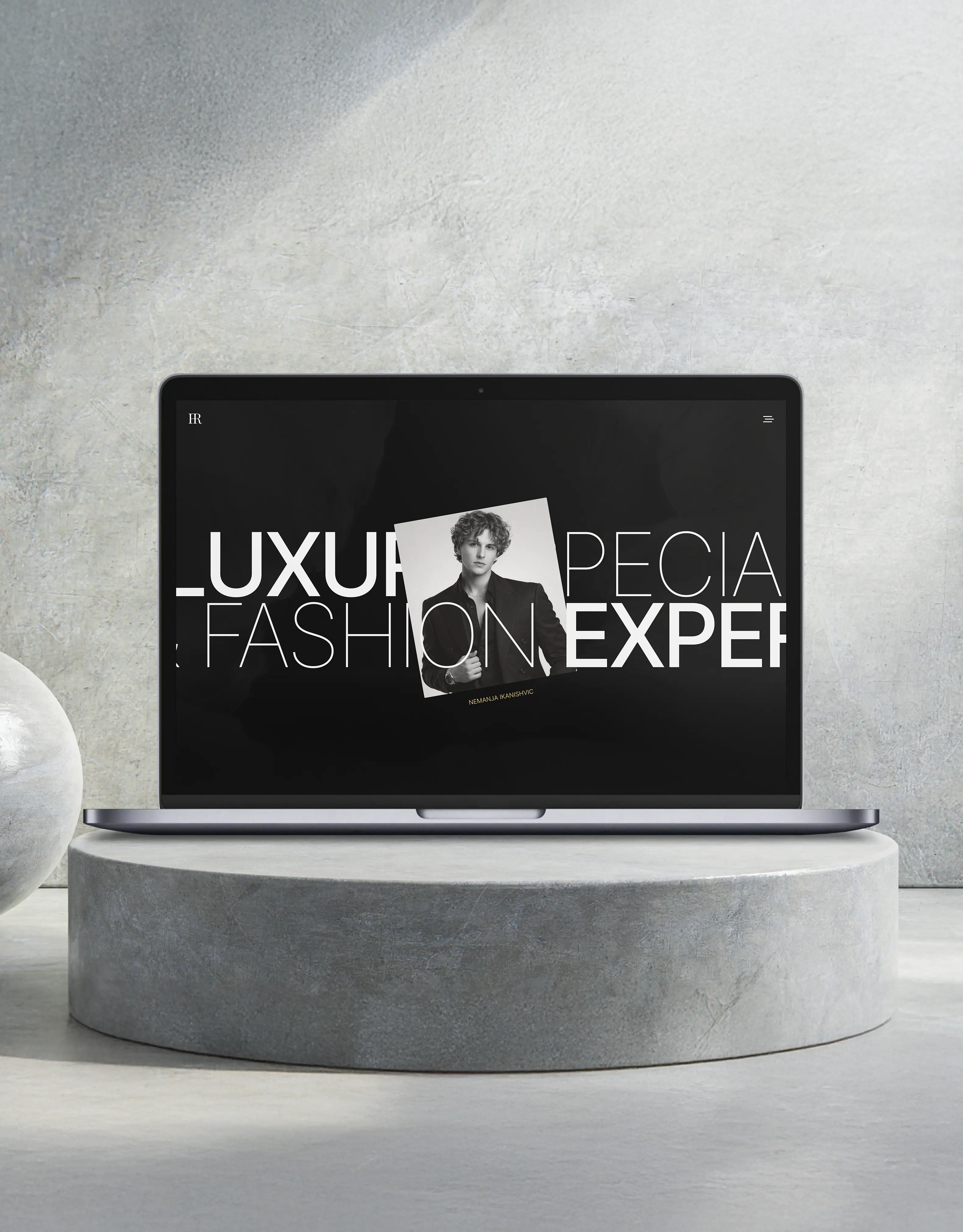 Luxury consultant website displayed on a laptop