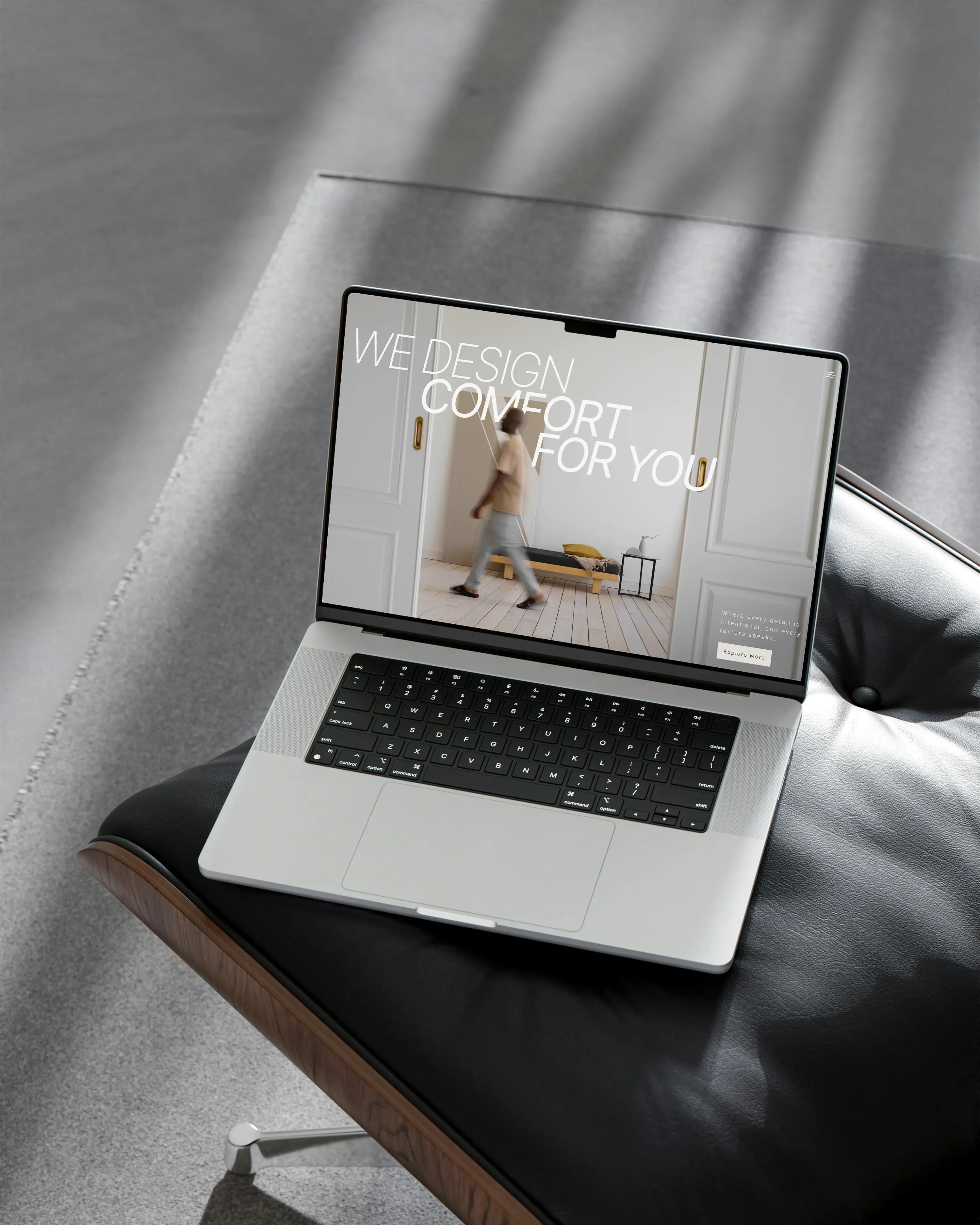 Interior design website shown on a laptop