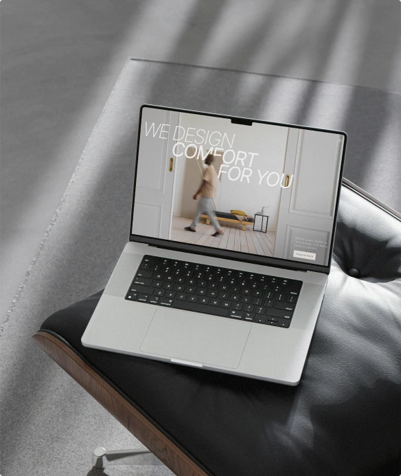 Interior design website shown on a laptop
