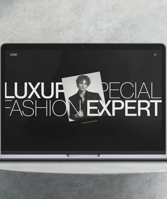 Consultant website displayed on a laptop